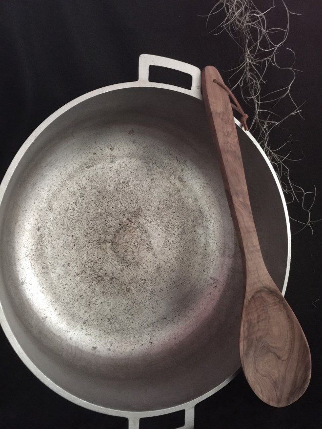 My pot holds 3.5 gallons. the spoon could probably be used as a paddle in a row boat!