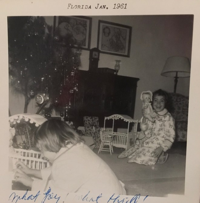 Look at the joy on Cynthia's face. We received our dollies, matching high chairs and cribs canopied with pompoms! 
